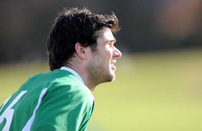 04.03.09 - Wales Rugby Training - Mike Phillips looks on during training. 
