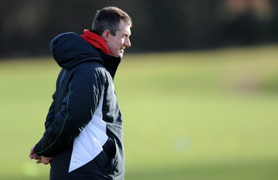 04.03.09 - Wales Rugby Training - Rob Howley(backs coach) looks on during training. 