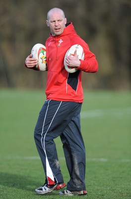 04.03.09 - Wales Rugby Training - Mark Bennett(fitness coach) makes a point during training. 