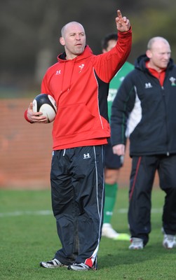 04.03.09 - Wales Rugby Training - Mark Bennett(fitness coach) makes a point during training. 