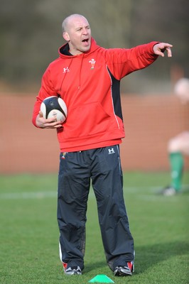 04.03.09 - Wales Rugby Training - Mark Bennett(fitness coach) makes a point during training. 