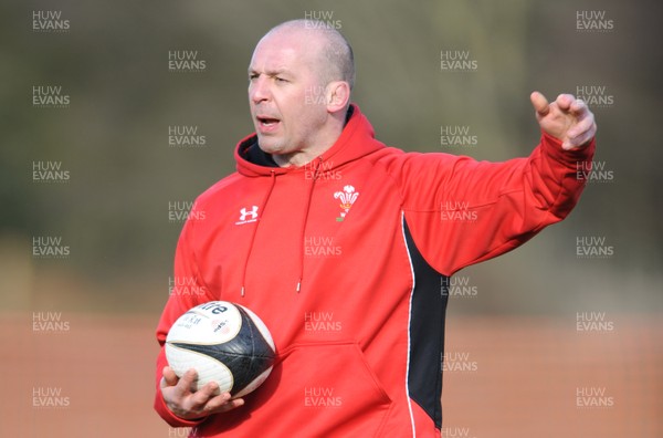 04.03.09 - Wales Rugby Training - Mark Bennett(fitness coach) makes a point during training. 