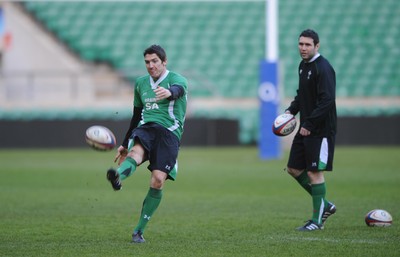 05.02.10 - Wales Rugby Training -  James Hook kicks as Stephen Jones looks on during training. 