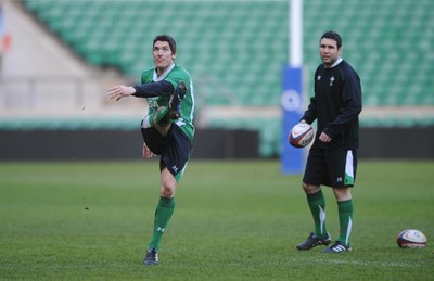 05.02.10 - Wales Rugby Training -  James Hook kicks as Stephen Jones looks on during training. 