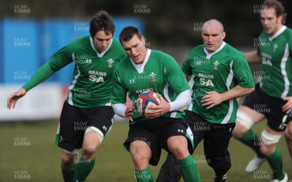 05.02.10 - Wales Rugby Training -  Tom James supported by l-r Ryan Jones, Gareth Williams and Alun Wyn Jones. 
