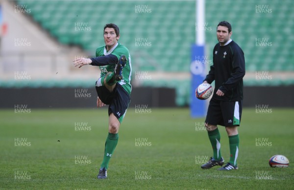 05.02.10 - Wales Rugby Training -  James Hook kicks as Stephen Jones looks on during training. 