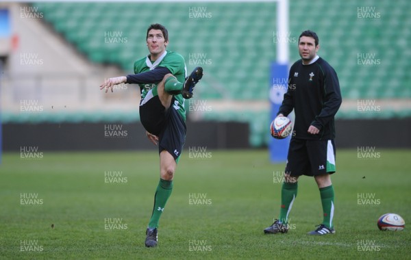 05.02.10 - Wales Rugby Training -  James Hook kicks as Stephen Jones looks on during training. 