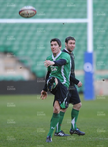 05.02.10 - Wales Rugby Training -  James Hook kicks as Stephen Jones looks on during training. 