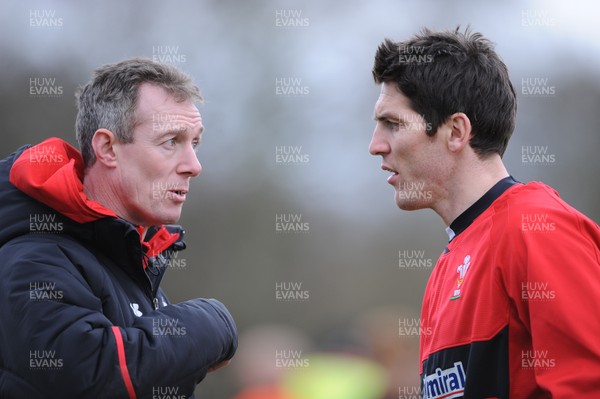 050213 - Wales Rugby Training -Wales coach Rob Howley talks to James Hook during training