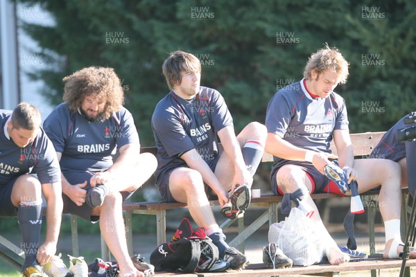 05.06.08 Wales rugby in S.Africa... Wales captain Ryan Jones gets ready for training with Rhys Thomas, Adam Jones and Alun Wyn Jones at Bishop School in Cape Town.   