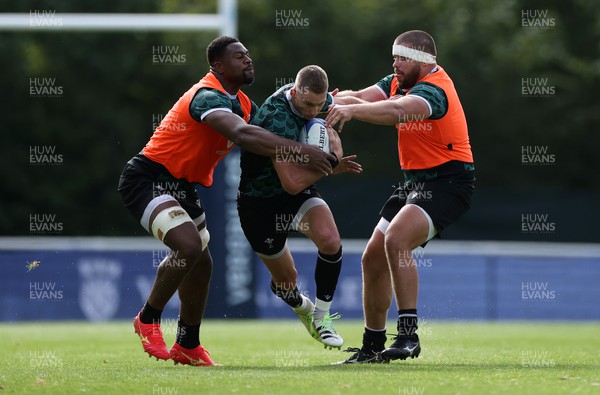 051023 - Wales Rugby Training in the week leading up to their final Rugby World Cup pool game against Georgia - Christ Tshiunza, Liam Williams and Nicky Smith during training