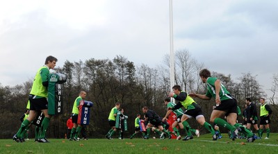 05.11.09 - Wales Rugby Training - Players hit the tackle bags during training. 