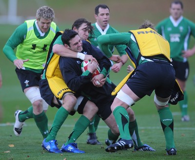 05.11.09 - Wales Rugby Training - Stephen Jones is tackled by Ryan Jones during training. 