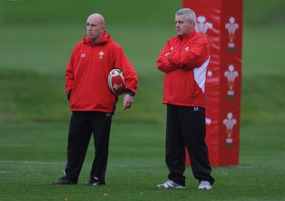 05.11.09 - Wales Rugby Training - Head coach Warren Gatland looks on with defence coach Shaun Edwards during training. 