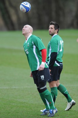 06.03.09 - Wales Rugby Training - Gavin Henson watches Tom Shanklin head a football during training. 