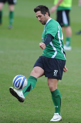 06.03.09 - Wales Rugby Training - Gavin Henson plays with a football during training. 
