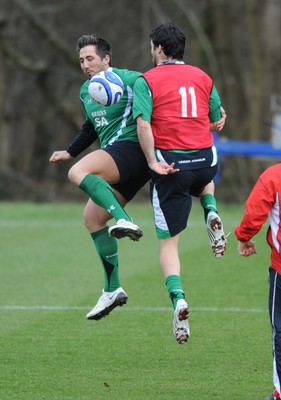 06.03.09 - Wales Rugby Training - Gavin Henson and Mike Phillips compete while they play with a football during training. 