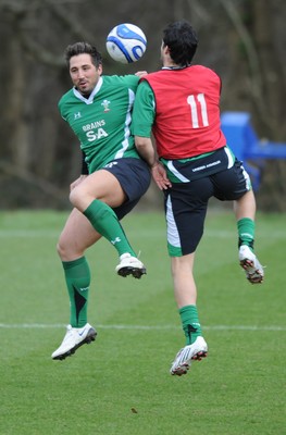 06.03.09 - Wales Rugby Training - Gavin Henson and Mike Phillips compete while they play with a football during training. 