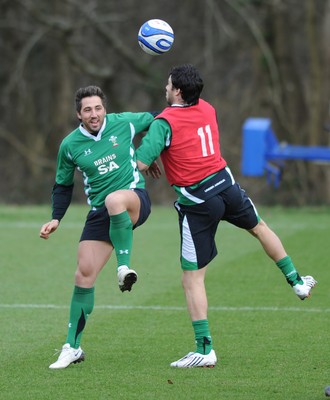 06.03.09 - Wales Rugby Training - Gavin Henson and Mike Phillips compete while they play with a football during training. 