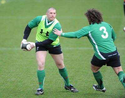 06.03.09 - Wales Rugby Training - John Yapp is caught by Adam Jones during training. 