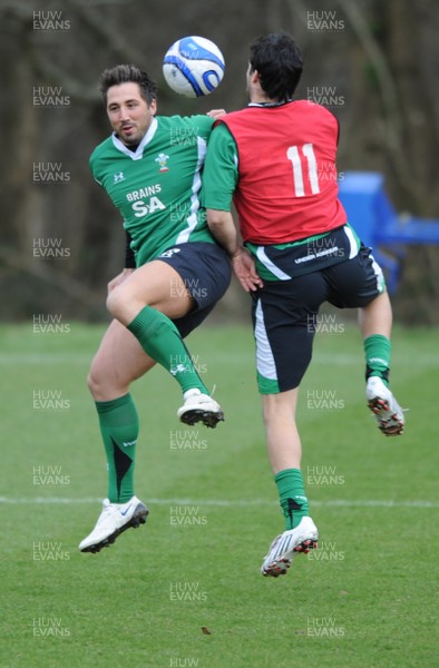 06.03.09 - Wales Rugby Training - Gavin Henson and Mike Phillips compete while they play with a football during training. 