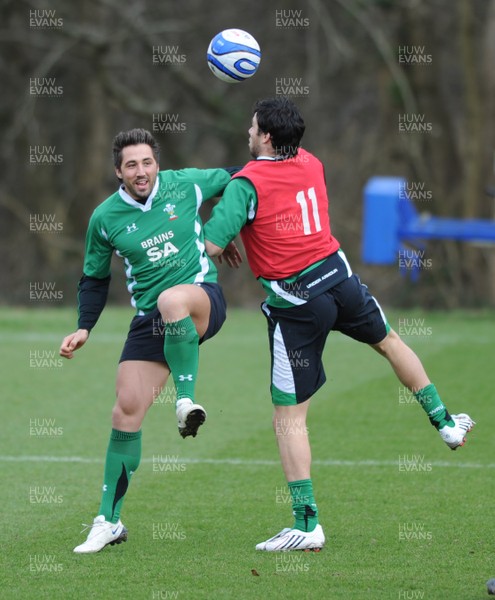06.03.09 - Wales Rugby Training - Gavin Henson and Mike Phillips compete while they play with a football during training. 