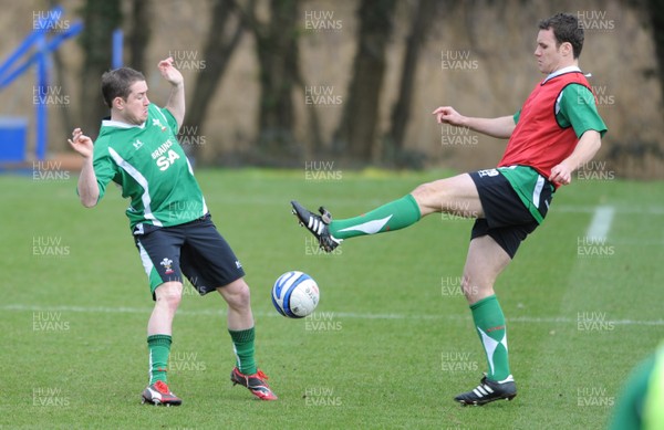 06.03.09 - Wales Rugby Training - Shane Williams and Mark Jones compete while they play with a football during training. 