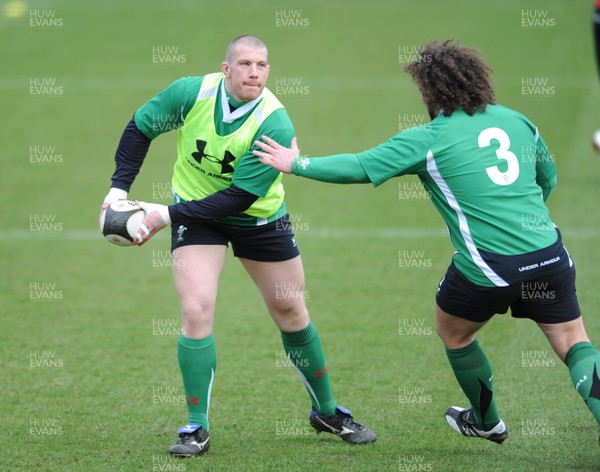 06.03.09 - Wales Rugby Training - John Yapp is caught by Adam Jones during training. 