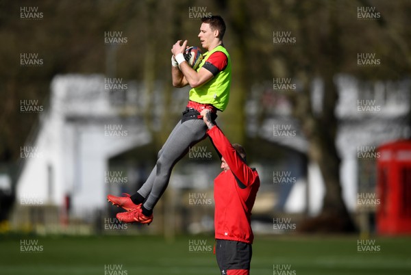 060320 - Wales Rugby Training - Liam Williams is lifted by Ross Moriarty during training