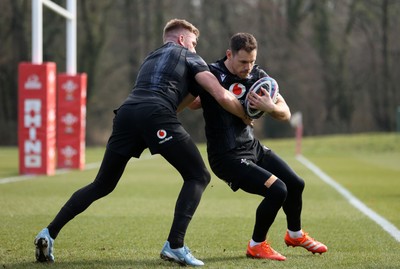 060325 - Wales Rugby Training ahead of their 6 Nations games against Scotland on the weekend - Tomos Williams during training