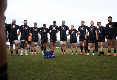 060325 - Wales Rugby Training ahead of their 6 Nations games against Scotland on the weekend - Wales team huddle