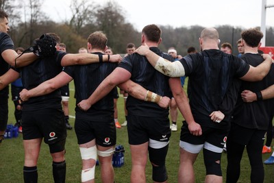 060325 - Wales Rugby Training ahead of their 6 Nations games against Scotland on the weekend - Wales team huddle 