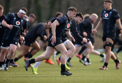 060325 - Wales Rugby Training ahead of their 6 Nations games against Scotland on the weekend - Jarrod Evans during training