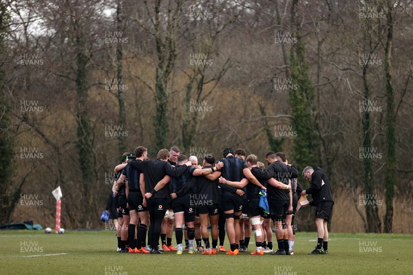 060325 - Wales Rugby Training ahead of their 6 Nations games against Scotland on the weekend - Wales team huddle