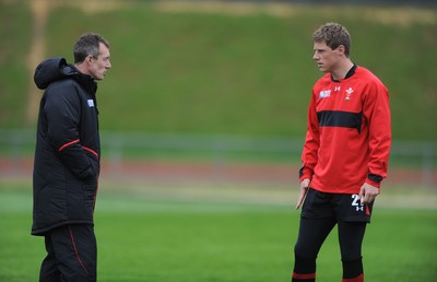 06.10.11 - Wales Rugby Training - Wales attack coach Rob Howley talks to Rhys Priestland during training. 