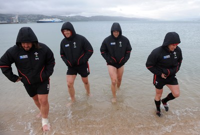 06.10.11 - Wales Rugby Training - Adam Jones, Alun Wyn Jones, Ryan Jones and Shane Williams during a recovery session in the sea off Wellington waterfront. 