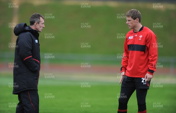 06.10.11 - Wales Rugby Training - Wales attack coach Rob Howley talks to Rhys Priestland during training. 