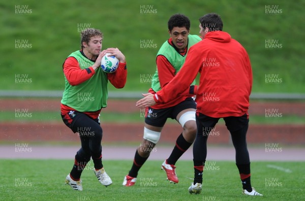 06.10.11 - Wales Rugby Training - Leigh Halfpenny takes on James Hook during training. 