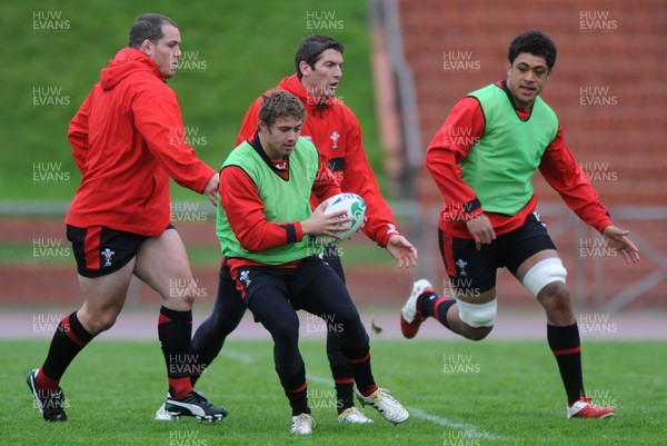 06.10.11 - Wales Rugby Training - Leigh Halfpenny takes on James Hook during training. 