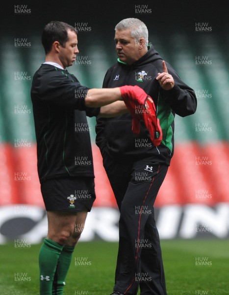 06.11.08 - Wales Rugby Training - Wales coach, Warren Gatland talks to Gareth Cooper during training. 