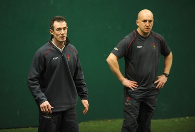 07.02.08 - Wales Rugby Training - Wales Defence Coach, Shaun Edwards(r) and backs coach, Rob Howley look on during training 