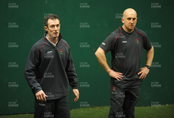 07.02.08 - Wales Rugby Training - Wales Defence Coach, Shaun Edwards(r) and backs coach, Rob Howley look on during training 