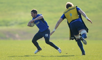 07.03.11 - Wales Rugby Training - Shane Williams steps around Alun Wyn Jones during training. 