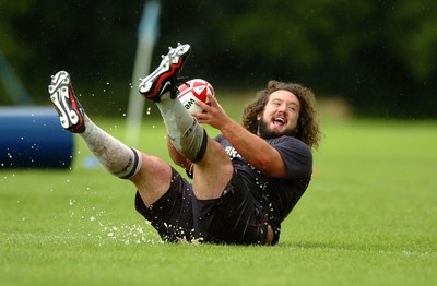 07.08.07 - Wales Rugby Training - Adam Jones enjoys the rain during training 