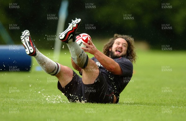 07.08.07 - Wales Rugby Training - Adam Jones enjoys the rain during training 