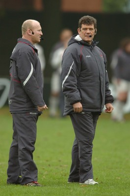 07.11.06  Wales rugby training... Coach Gareth Jenkins during training with Neil Jenkins(lt). 