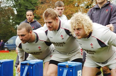 07.11.06  Wales rugby training... Front row of Chris Horsman,Rhys Thomas and Duncan Jones during training. 