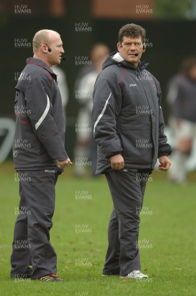 07.11.06  Wales rugby training... Coach Gareth Jenkins during training with Neil Jenkins(lt). 