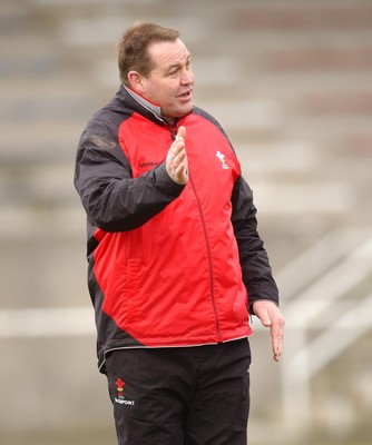 080203 - Wales Rugby Training - Welsh Coach Steve Hansen looks on as team train