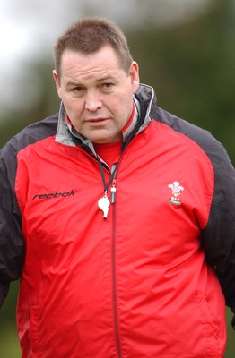 080203 - Wales Rugby Training - Welsh Coach Steve Hansen looks on as team train